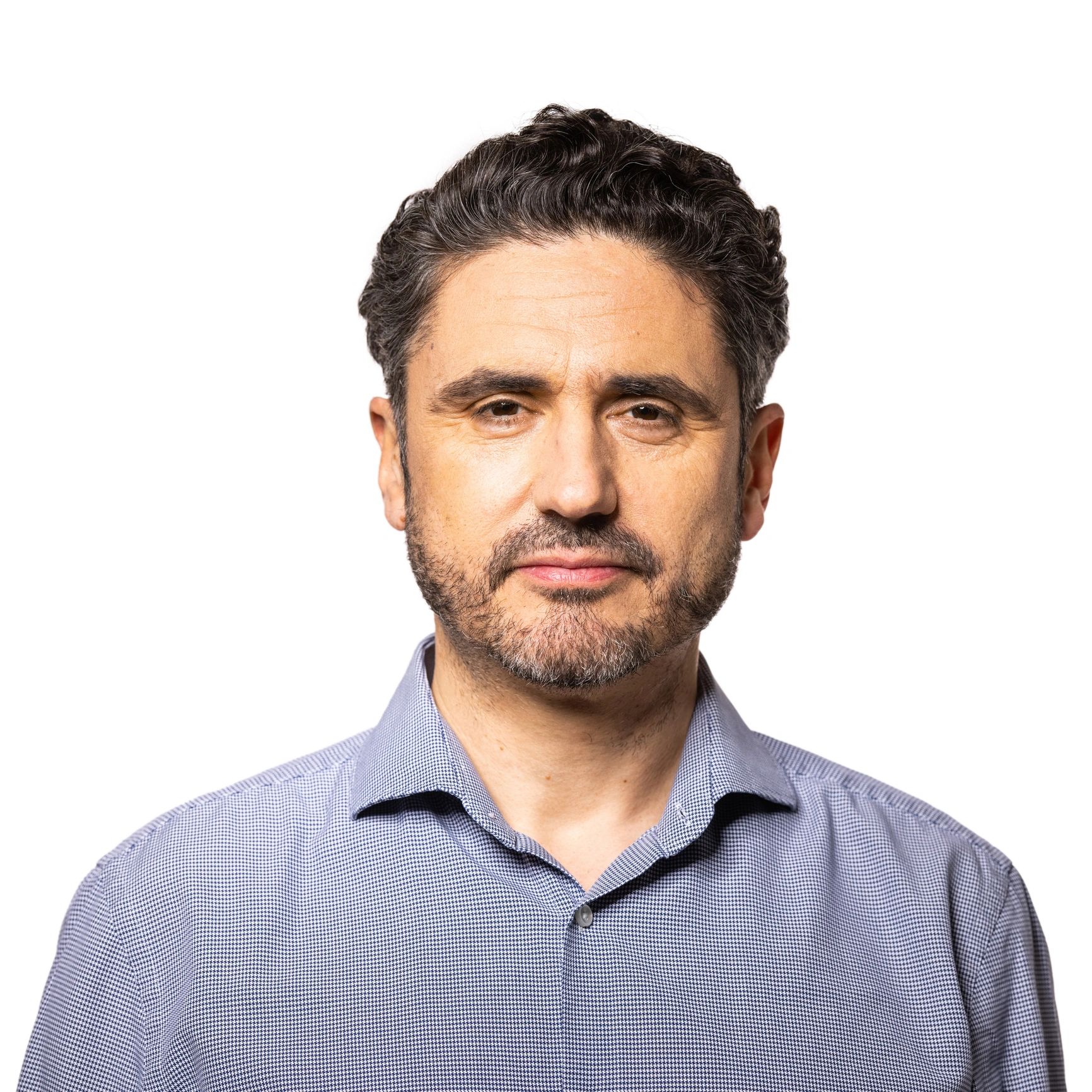 Professional headshot of a male clinician