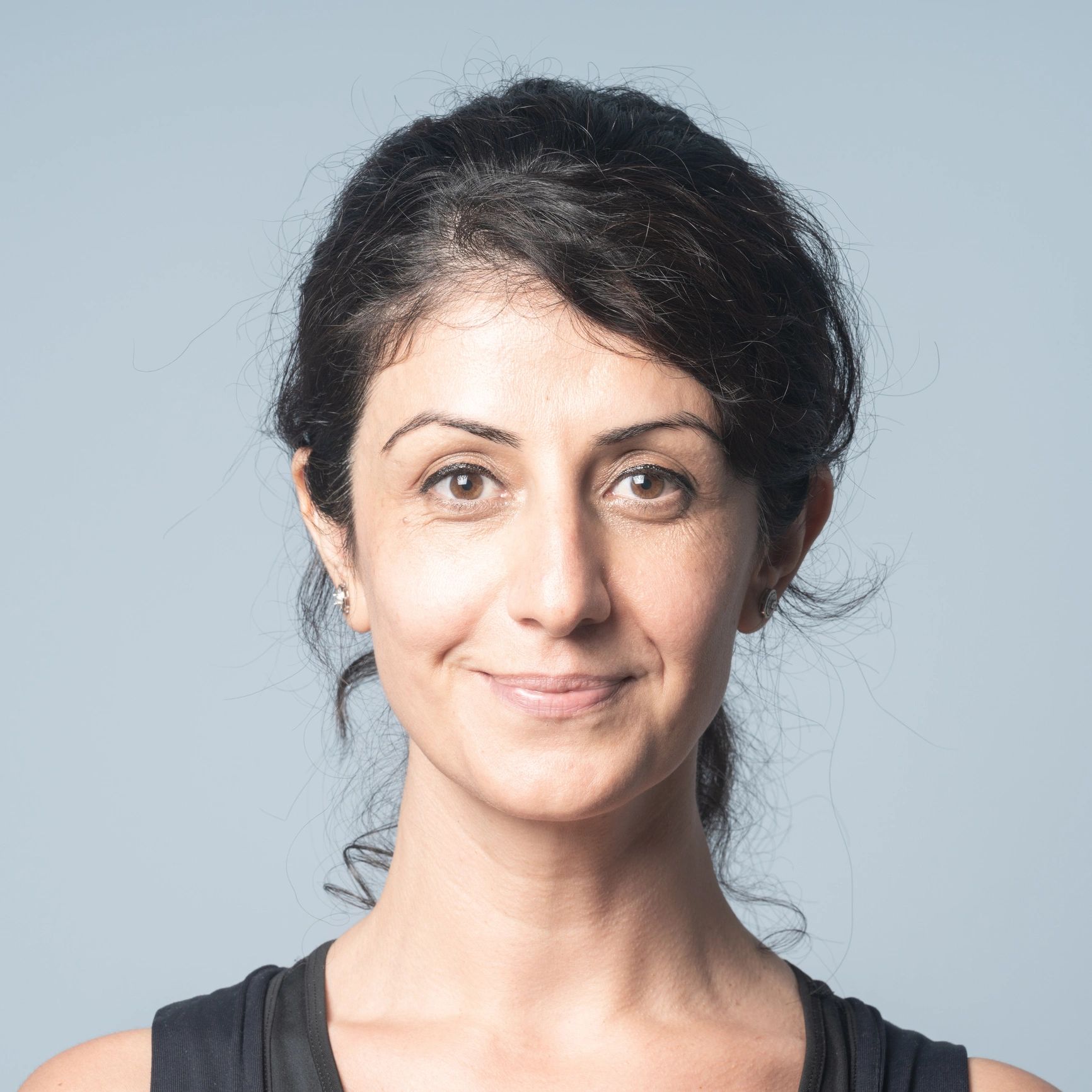 Professional headshot of a female wellness professional